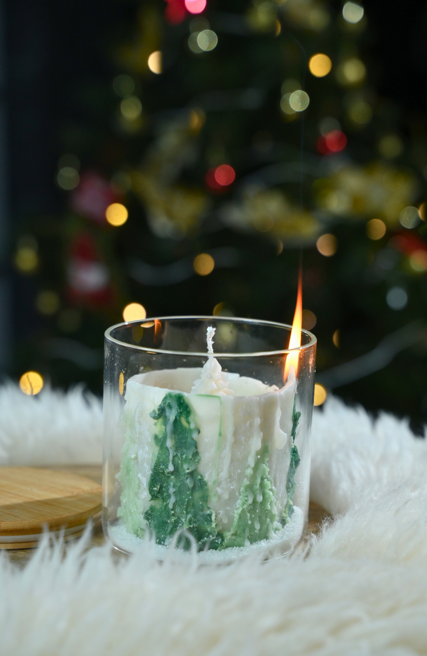 Christmas tree jar candle with hand-painted trees and spiral burn reveal Hand-poured soy wax jar candle with winter forest design Festive spiral-burning candle revealing Christmas tree inside Winter forest candle in jar with hidden Christmas tree by Rey of Light