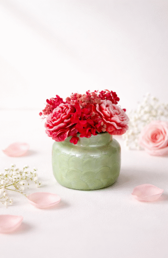 Floral Bouquet candle in Green Jar